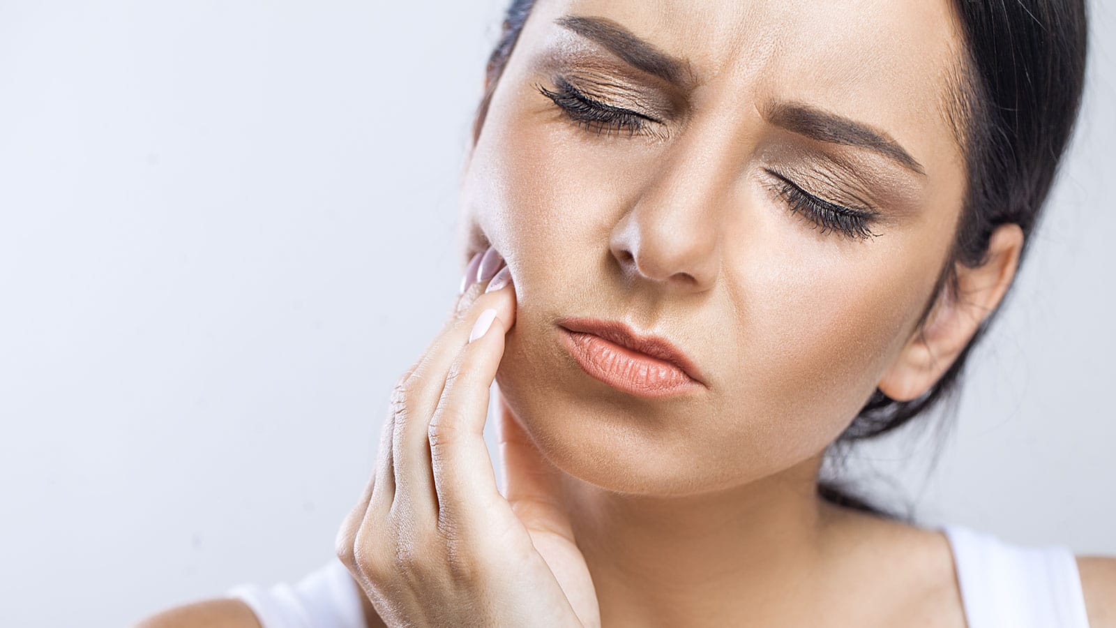 mujer-con-dolor-de-muelas